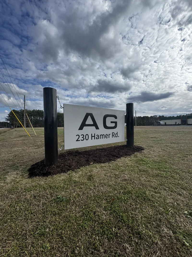Post-and-panel monument, AG on Hamer Road